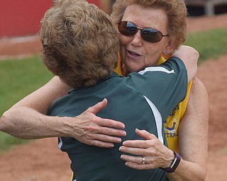 William D. Lewis Th Vindicator   Champion'head coach Cheryl Weaver gets congrats from an official after 6-1-18 win over North Union at Akron to advance to state championship game.