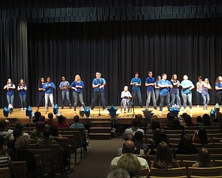 Neighbors | Zack Shively.The choir's dinner event gave the program a fundraiser to help them improve the program. In addition to tickets for the dinner, they also sold tickets for a 50/50 raffle and t-shirts. Pictured, the high school choir performed "Footloose."