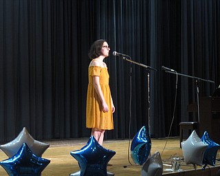 Neighbors | Zack Shively.The high school's choir had a special concert for their families on May 19 after a dinner. The concert featured small ensembles, duets and solo performances. Pictured, Hailey Semchee performed "A Change In Me."