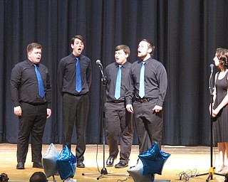 Neighbors | Zack Shively.The high school choir's concert had performances from 45 students in 20 songs during two acts. The songs they sang came from Broadway musicals. Pictured, Emily Garek and a barbershop quartet sang "Lida Rose" and "Will I Tell You" from the musical "The Music Man."