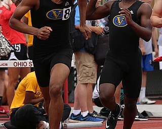 COLUMBUS, OHIO - June 1, 2018, OHSAA Track & Field Championships at Jesse Owens Stadium, Ohio State University-  D3 4x200 Youngstown Valley Christian's Jamynk Jackson hands the baton to his teammate Terrance White as YVC qualifies for the final.  SPECIAL TO | THE VINDICATOR