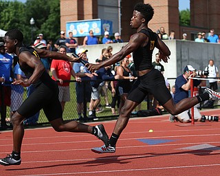 COLUMBUS, OHIO - June 2, 2018, OHSAA Track & Field Championships at Jesse Owens Stadium, Ohio State University-  D3 4x200 Youngstown Valley Christian School's Jamynk Jackson passes the baton to his teammate Lohron Brown during YCVS's winning state title effort.  SPECIAL TO | VINDICATOR