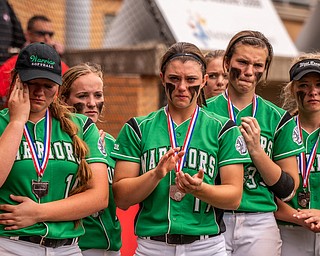 DIANNA OATRIDGE | THE VINDICATOR West Branch players, left to right, Kelsey Byers, Sidney Milliken, Kylie Coffelt, Peyton Alazaus, and Riley Mesley, react after their twelve inning 3-2 loss against Keystone in the Division State Championship in Akron on Saturday..