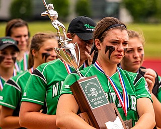 DIANNA OATRIDGE | THE VINDICATORÊ West Branch's Kylie Coffelt holds the Division II State Runner-up trophy as her teammates look on after their 3-2 loss to Keystone on Saturday in Akron..