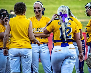 DIANNA OATRIDGE | THE VINDICATORÊ Champion coach Cheryl Weaver talks to her team on the mound after Cardington-Lincoln scored a run during the Division III State Championship in Akron on Saturday..