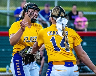 DIANNA OATRIDGE | THE VINDICATORÊ Champion's Sophie Howell (right) congratulates pitcher Allison Smith (left) after a strikeout during the Division III State Championship in Akron on Saturday.