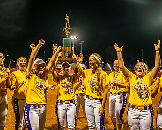 DIANNA OATRIDGE | THE VINDICATORÊ The Champion softball team celebrates after being awarded the Division III State Championship in Akron on Saturday. They defeated Cardington-Lincoln 9-4.