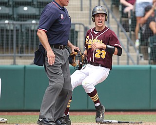 South Range's Jaxon Anderson (23) celebreates as he crosses home plate because of a sacrifice fly out during Saturday afternoons State Championship matchup at huntington Park in Columbus. Dustin Livesay  |  The Vindicator  6/2/18  Columbus