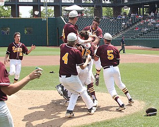 The South Range baseball team dumps water on the head of Brandon Youngs (27) who recorded the last out from the pitchers mound during Saturday afternoons State Championship matchup at huntington Park in Columbus. Dustin Livesay  |  The Vindicator  6/2/18  Columbus