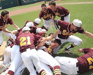 The South Range baseball team celebrates with a dog pile after they won the State Championship on Saturday afternoon defeating Coldwater by a score of 3-2 at huntington Park in Columbus. Dustin Livesay  |  The Vindicator  6/2/18  Columbus