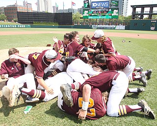 The South Range baseball team celebrates with a dog pile after they won the State Championship on Saturday afternoon defeating Coldwater by a score of 3-2 at huntington Park in Columbus. Dustin Livesay  |  The Vindicator  6/2/18  Columbus