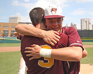 South Range freshman Jake Gehring (9) hugs teammate Mike Cunningham (3) in celebration after winning Saturday afternoons State Championship matchup at huntington Park in Columbus. Dustin Livesay  |  The Vindicator  6/2/18  Columbus