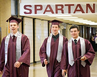 William D. Lewis The Vindicator   Boardman grads from left, Jacob Smotzer, David Giancola and Devin Whitaker walk through hall of BHS one last time before 6-3-18 commencement.