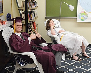 William D. Lewis The Vindicator Taking it easy before start of Boardman commencement at grads Sean Buck and Annaliisa(correct) Cordova.