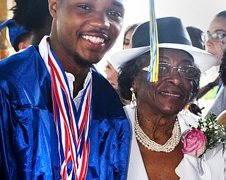 William D. Lewis The Vindicator  Valley Chritian grad Terrance White sharea a moment with his grandmother Lenora White after 6-3-18 commencement at Highway Tabernacle. Terrance was a member of the 4x2 Valley Christian School relay team that took a first place at State track in Columbus this weekeand.