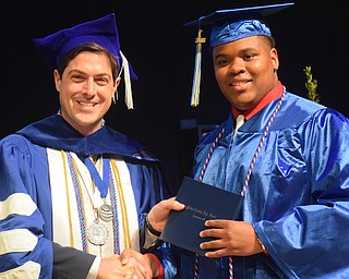 William D. Lewis The Vindicator  Valley Christian grad Randy MAdison gets his diploma from Dr. Joushua Reichard during 6-3-18 commencement.