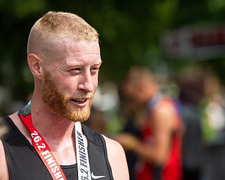 Scott R. Galvin | The Vindicator.Erik Reed of East Liverpool smiles after he wins the first inaugural Youngstown Marathon on Sunday, June 3, 2018.