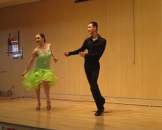 Neighbors | Zack Shively.The school had performances from students and outside organizations. The Labra Brothers played first to open the event. Slippery Rock university's Afro-Colobian Dance Ensemble also performed. Pictured, Hannah Balash from Poland Seminary High School and Alexander Bell of James A. Garfield High School did a swing dance.