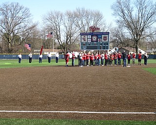 Neighbors | Zack Shively.The Fitch pep band played the "Star Spangled Banner" and a military color guard stood and saluted in the center of the outfield during the pre-game ceremony to honor veterans.