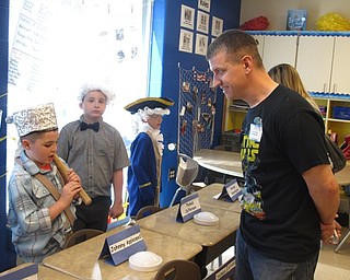 Neighbors | Zack Shively.Austintown Elementary School's second grade classes began their wax museum projects on May 2. The students in the class chose a historic figure to represent in their museum. Pictured, Cole, as Johnny Appleseed, gave a presentation about Appleseed.