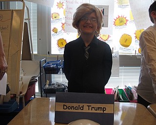 Neighbors | Zack Shively.The second grade could choose people from long-standing history, like Betsy Ross, or historic figures from recent history, such as Donald Trump, for their wax museum project. Pictured is Jacob Duzzny as President Trump.
