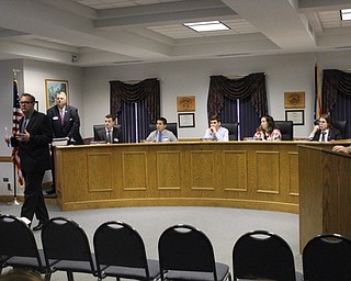 Neighbors | Abby Slanker.Canfield City Council President John Morvay (left) welcomed Canfield High School juniors and seniors to the 38th annual Civic Day, sponsored by the Rotary Club of Canfield, as Canfield Mayor Richard Duffett (back left) and Canfield City Council Member Bruce Neff (right) looked on.