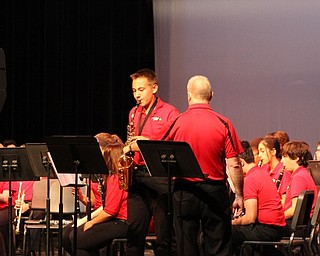 Neighbors | Abby Slanker.Canfield Village Middle School eighth-grader Ray Bernat performed an improvisational solo on his alto saxophone during “Along for the Ride” at the annual CVMS spring concert at the Canfield High School on May 9.
