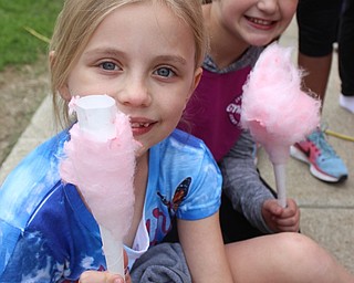 Neighbors | Abby Slanker.Two Hilltop Elementary School third-grade students enjoyed their hand-spun pink cotton candy on May 11.