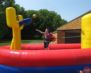 Neighbors | Zack Shively.Stadium Drive Elementary's field day gave the students a special day at the end of the school year to have fun together as a class and paticipate in many enjoyable activities, such as the basketball bounce around station. The school has the event every year near the end of the school year.