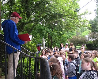 Neighbors | Zack Shively.Third-grade students at Dobbins Elementary went on a history walk led by the Historical Society on May 23. Pictured, Dave Smith, Poland Historical Society Sectretary, talked to the students about one of Poland's many historic buildings.