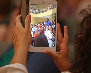 ROBERT K YOSAY  | THE VINDICATOR..Capturing the moment....Ford Family Recital Hall located in the DeYor Performing Arts Center. More than 60 full time students graduated from the three adult education programs offered at Choffin: 15 Dental Assisting students, 33 Practical Nursing students, and 18 Surgical Technology students..-30-