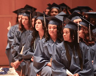 ROBERT K YOSAY  | THE VINDICATOR..Graduates listen to the commencement speaker ....Ford Family Recital Hall located in the DeYor Performing Arts Center. More than 60 full time students graduated from the three adult education programs offered at Choffin: 15 Dental Assisting students, 33 Practical Nursing students, and 18 Surgical Technology students..-30-