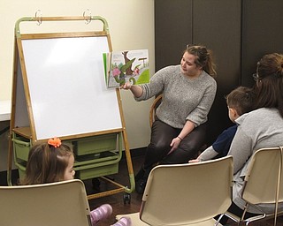 Neighbors | Zack Shively.The Boardman library had their "Smart Money Story Time" on April 25. The program focused on getting children familiar with money. Pictured, librarian Amy Burkard read “Little Croc’s Purse” by Lizzie Finlay to the children.