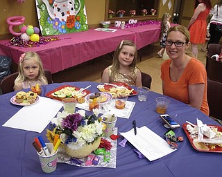Neighbors | Zack Shively.Boardman Park invited mothers and daughters to their annual "Mommy and Me for Tea" Mother's Day event on May 6. The event had food and crafts for the families. Pictured are Laura Kraft and her daughters Alivia and Alaina Kraft at the event.