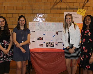 Neighbors | Abby Slanker.Canfield Village Middle School students, from left, Tristin Wendt, Riley Kinkade, Jackie Kinnick and Tanya PaiDhungat were recognized at the school’s second annual ACE celebration event for working with Ironwoods Nursing Home on their Friend Finder Project on May 11.