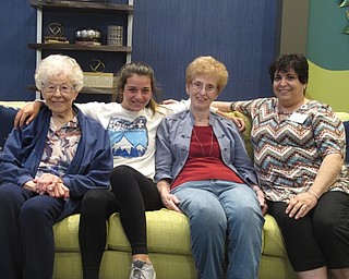 Neighbors | Zack Shively.Middle school student Hannah Masucci has begun spending time volunteering at The Inn at the Poland Way senior living center. She began in March after an emotionally difficult year in school. She volunteered as a way to bring positivity in her life. She has been a big help to the facility. Pictured, Hannah sat with activities director Kathy Boosinger and two of the residents.