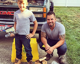 Brittney Tomko, fiancee of Michael Martinko, came home to find him and his son, Jack, fixing one of Michael’s old trucks and took this snapshot. Today also happens to be Jack’s 9th birthday.
