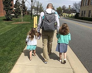 Dad  Dan DeLuca is on duty as he walks with daughters Adalynn and Francescay. The photo was snapped by his wife, Amie.
