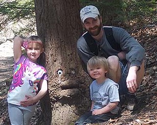 Sometimes being a dad can be a walk in the park – Mill Creek Park. Nathan Grimes takes his daughter, Abby, and son, Nathan M., on treks through the park. Kelly Grimes sent in the photo.

