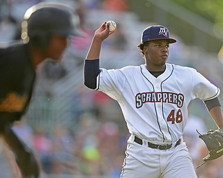 NILES, OHIO - JUNE 15, 2018: Mahoning Valley Scrappers tarting pitcher Juan Mota looks to first before throwing out West Virginia Black Bears' Raul Siri in the third inning, Friday night at Eastwood Field. DAVID DERMER | THE VINDICATOR