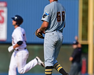 NILES, OHIO - JUNE 17, 2018: West Virginia Black Bears relief pitcher Nicholas Economos waits for Mahoning Valley Scrappers' Simeon Lucas to run the bases after hitting a solo home run in the sixth inning of a baseball game, Sunday afternoon. The Scrappers won 10-9. DAVID DERMER | THE VINDICATOR