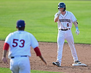 NILES, OHIO - JUNE 17, 2018: Mahoning Valley Scrappers' Mitch Reeves attempts to call off Luis Oviedo after hitting a game winning single in the ninth inning of a baseball game against the West Virginia Black Bears, Sunday afternoon. The Scrappers won 10-9. DAVID DERMER | THE VINDICATOR