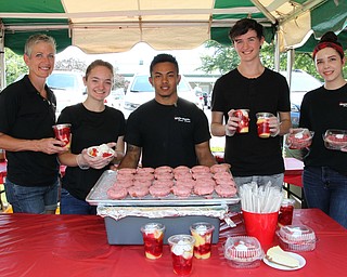 White House Fruit Farms employees, (L-R) Kim Sisco, Cassandra Wasilewski, Joe Jetomo, Ian Harver, and Sydeney Olsavsky show off the many strawberry inspired food options for sale during the Strawberry Festival at White House Fruit Farms in Canfield on Sunday afternoon.  Dustin Livesay  |  The Vindicator  6/17/18  Canfield.