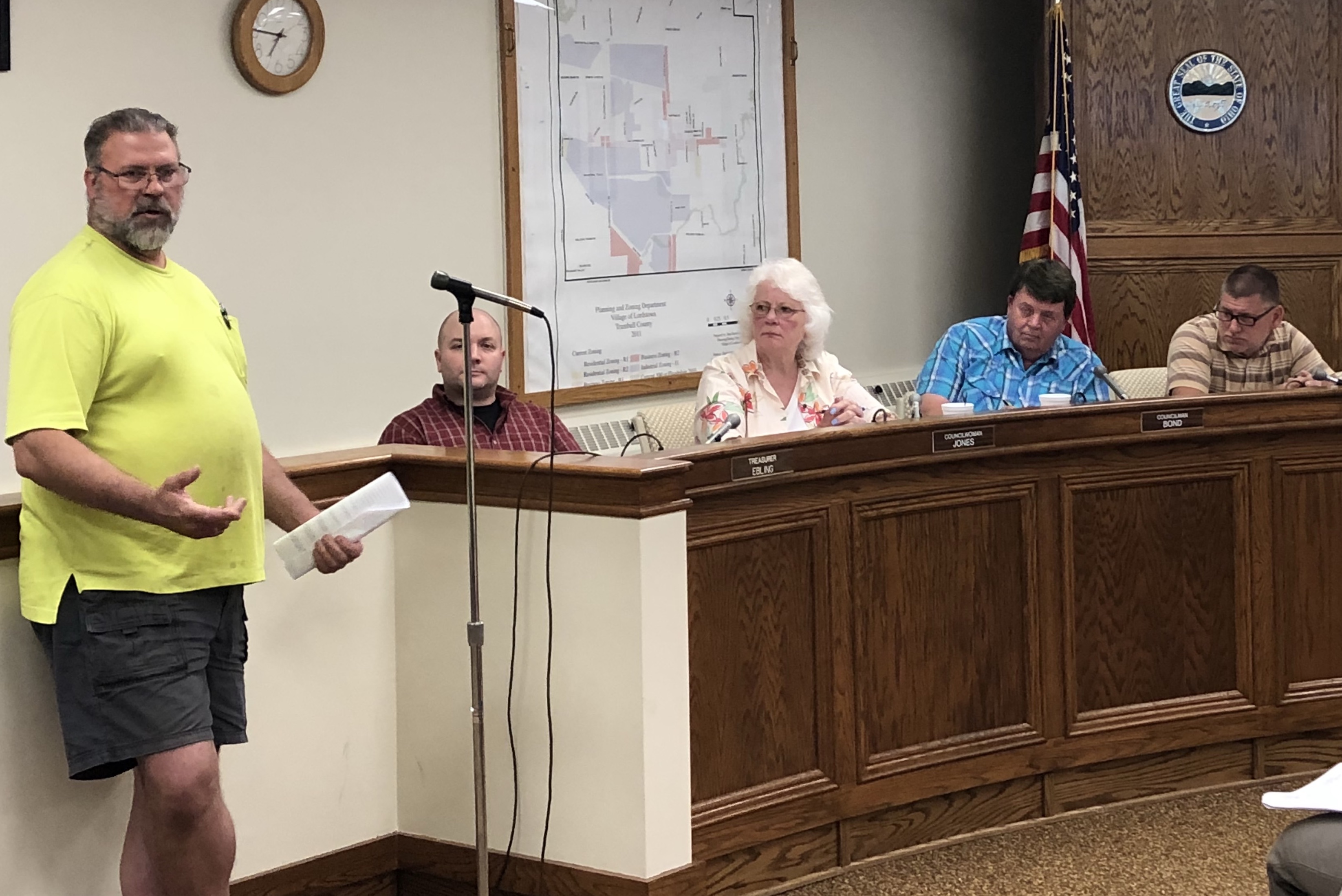 Village resident Robert Shaffer speaks in support of the TJX distribution center project Monday. Council is considering ordinances to rezone seven parcels, totaling 290 acres, on Ellsworth Bailey and Hallock Young roads from residential to industrial.