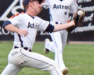 William D. Lewis the vindicator  Astro Falcons(23) stretches out to catch a foul ball of the bat of Knightline's (30) during first inning of 6-20-18 game at Cene.