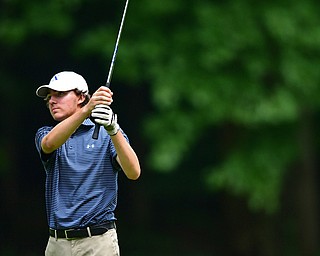 BOARDMAN, OHIO - JUNE 20, 2018: Jared DeVille, from Loveland, Ohio, follows his approach shot on the 18th hole during the second round of the AJGA junior tournament, Wednesday afternoon at Mill Creek Golf Course. DAVID DERMER | THE VINDICATOR