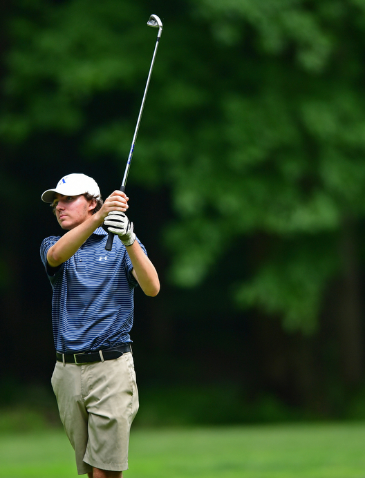 BOARDMAN, OHIO - JUNE 20, 2018: Jared DeVille, from Loveland, Ohio, follows his approach shot on the 18th hole during the second round of the AJGA junior tournament, Wednesday afternoon at Mill Creek Golf Course. DAVID DERMER | THE VINDICATOR