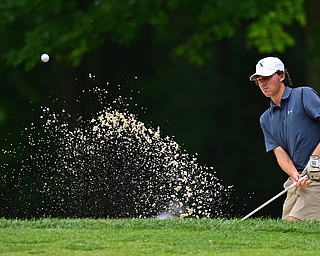 BOARDMAN, OHIO - JUNE 20, 2018: Jared DeVille, from Loveland, Ohio, follows his show from a sand trap on the 18th hole during the second round of the AJGA junior tournament, Wednesday afternoon at Mill Creek Golf Course. DAVID DERMER | THE VINDICATOR