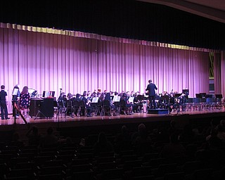 Neighbors | Zack Shively.Austintown Middle School's sixth grade band, led by Jeremy McClaine, played five songs, opening with "Trumpet Voluntary." McClaine thanked the audience for attending and supporting the studnets and Fitch for hosting the event.