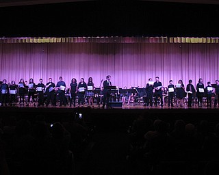 Neighbors | Zack Shively.Music teacher Jeremy McClaine recognized some of his sixth grade students for their work during the school year. Pictured, he recognized students for participating in the middle school jazz band and maintaining an "A" grade through the year.